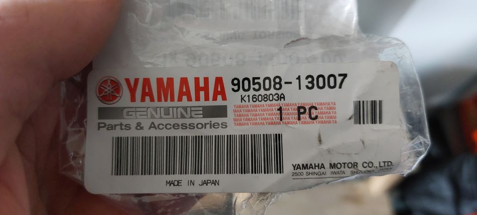 Yamaha FZS kytkinvaijerin palautusjousi