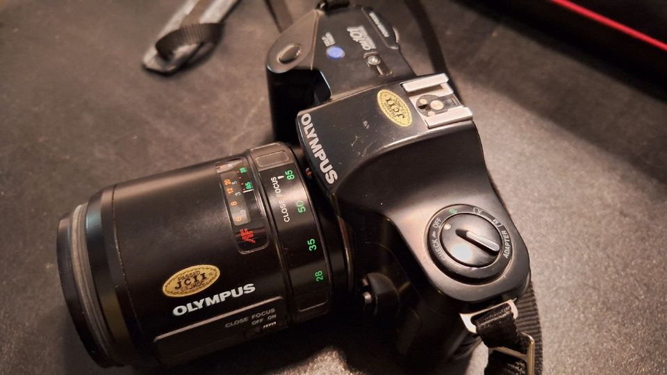 Olympus kamera, kameralaukku, teline