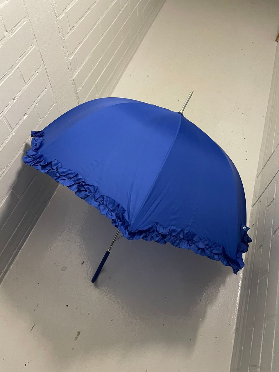 Sininen sateenvarjo