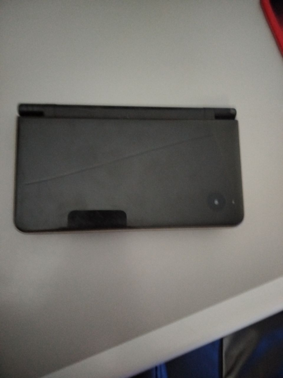 Nintendo DSI XL Peli mukana