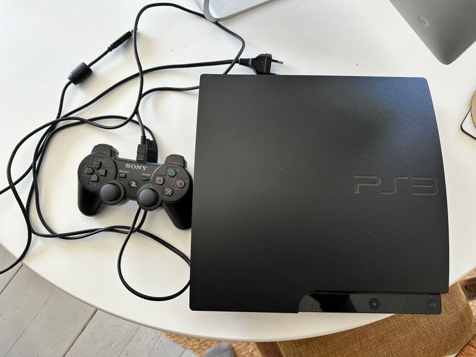 Sony Playstation 3 -konsoli + kaukosäädin