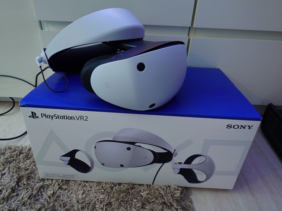Playstation VR2 + ohjaintelakka