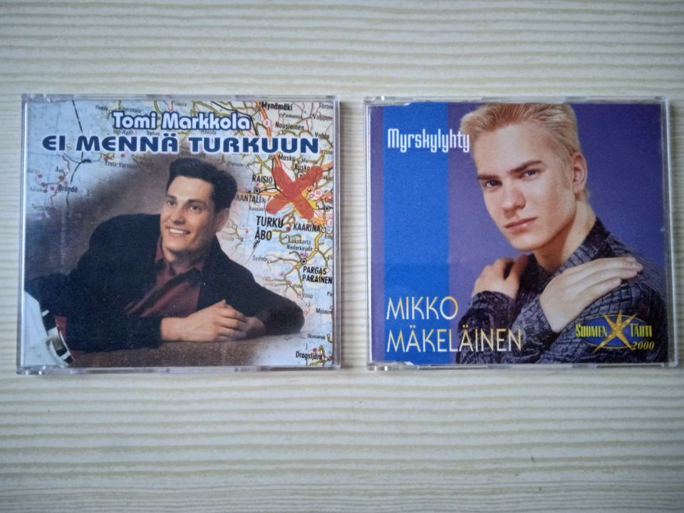CD-singlet: Tomi Markkola - Ei mennä Turkuun ja Mikko Mäkeläinen - Myrskylyhty