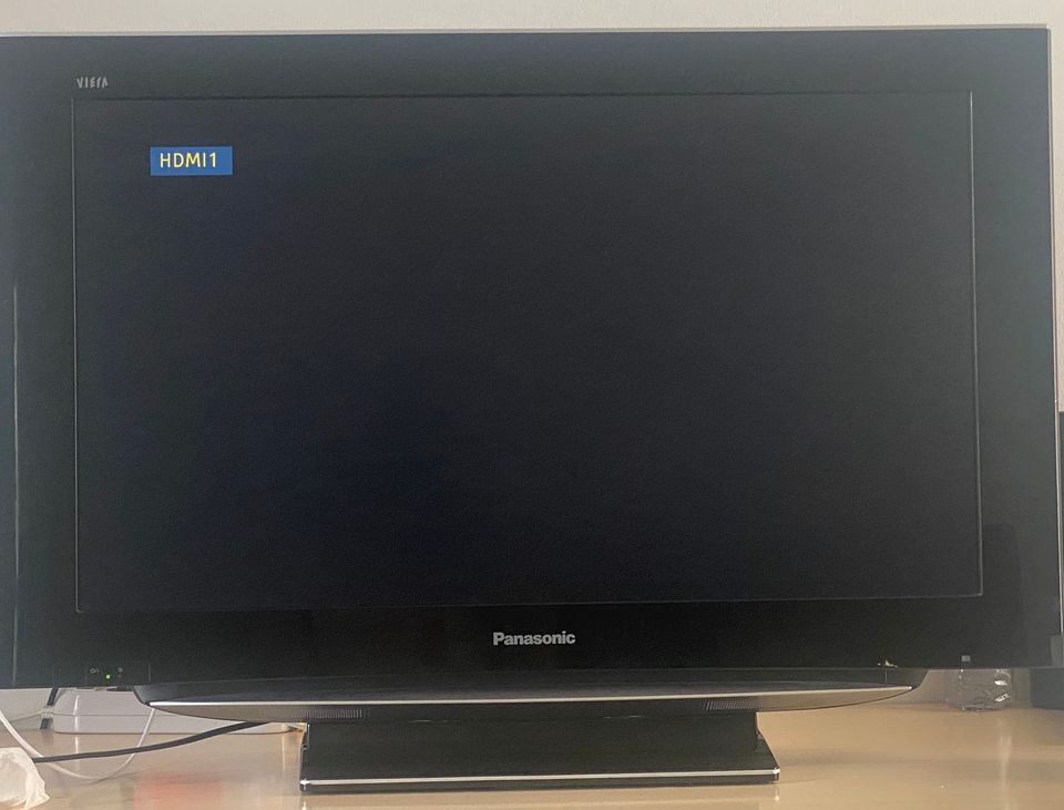 Panasonic Tv (32”) with a remote