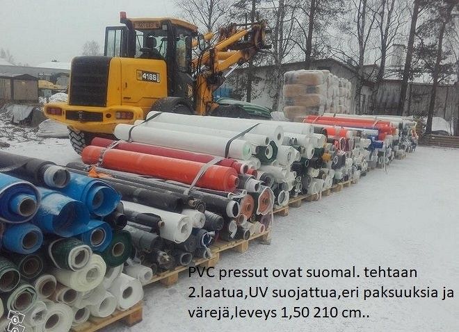 Säilörehu suojamuovin päälle PVC pressua ja paksuja köysipainoja