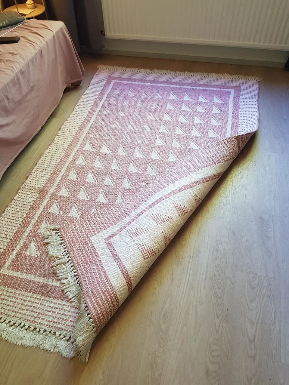 pink and white patterned carpet