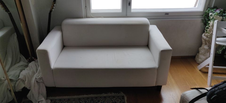 Valkoinen kangas sohva