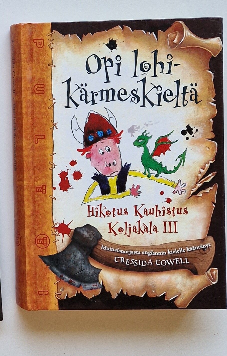 Opi lohikärmeskieltä lastenkirja