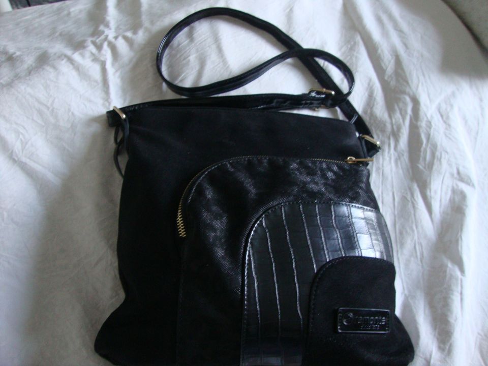 Musta, kaunis laukku