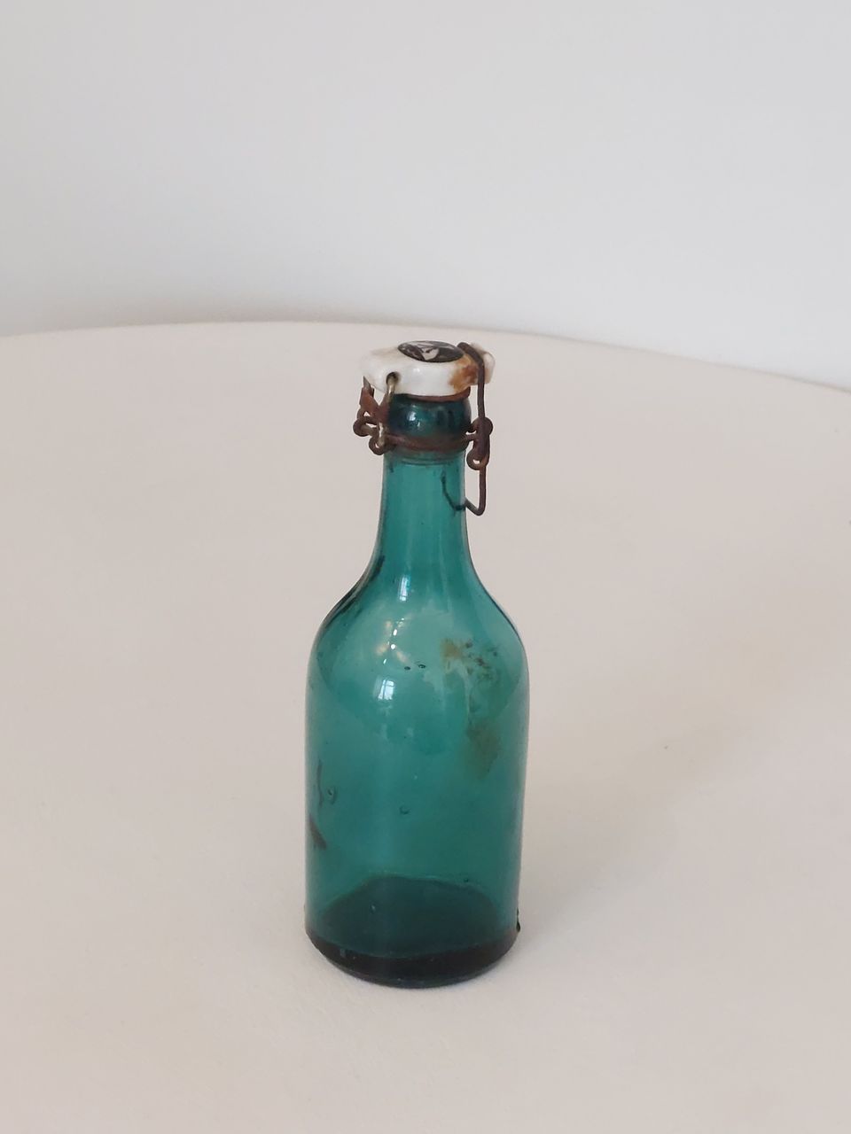 Vintage vihreä lasipullo