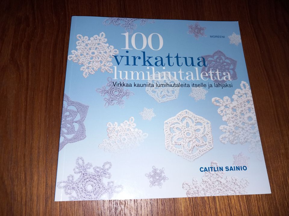 100 virkattua lumihiutaletta - Caitlin Sainio