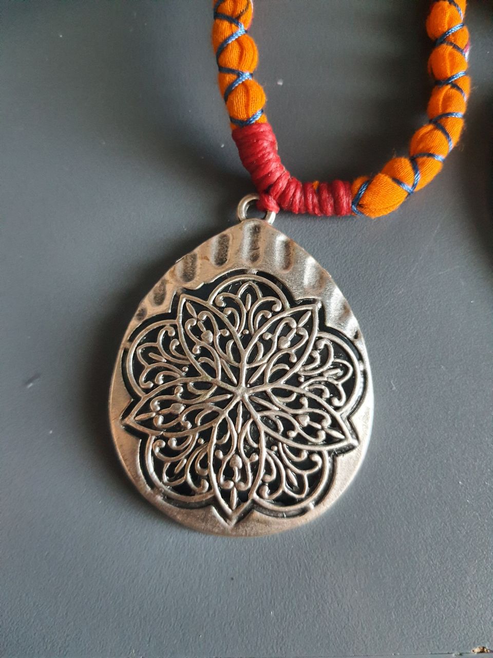 Amuletti Kaulakoru