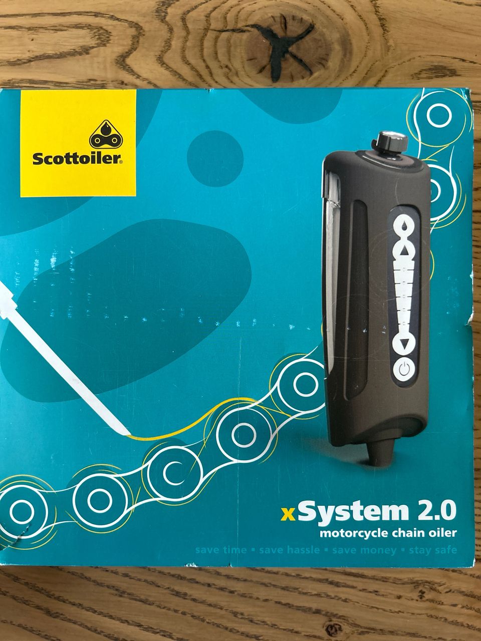 Scottoiler xSystem 2.0 sähköinen ketjunvoitelulaite dual injectorilla