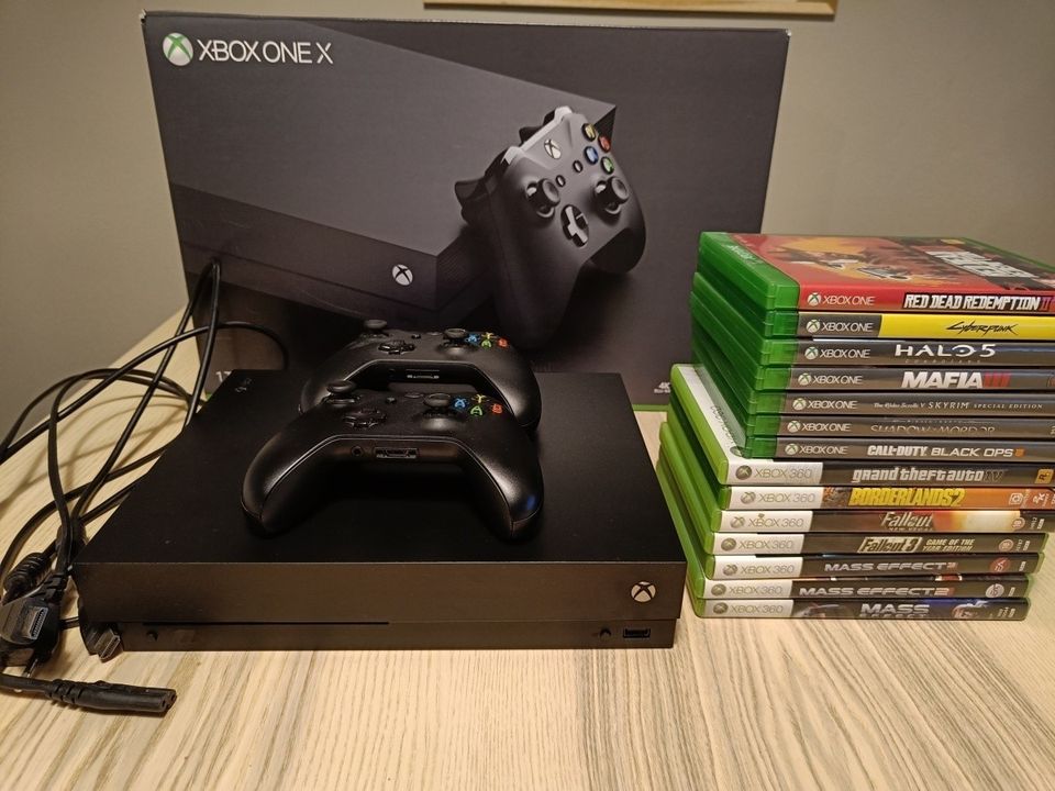Xbox One X 1Tb + 2 langatonta ohjainta + 14 peliä