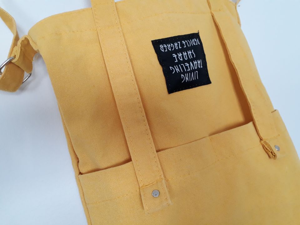 Keltainen laukku / olkalaukku