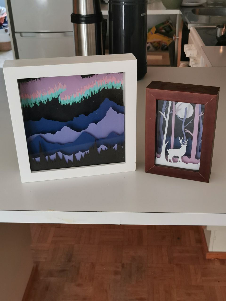 Handmade paper worlds framed