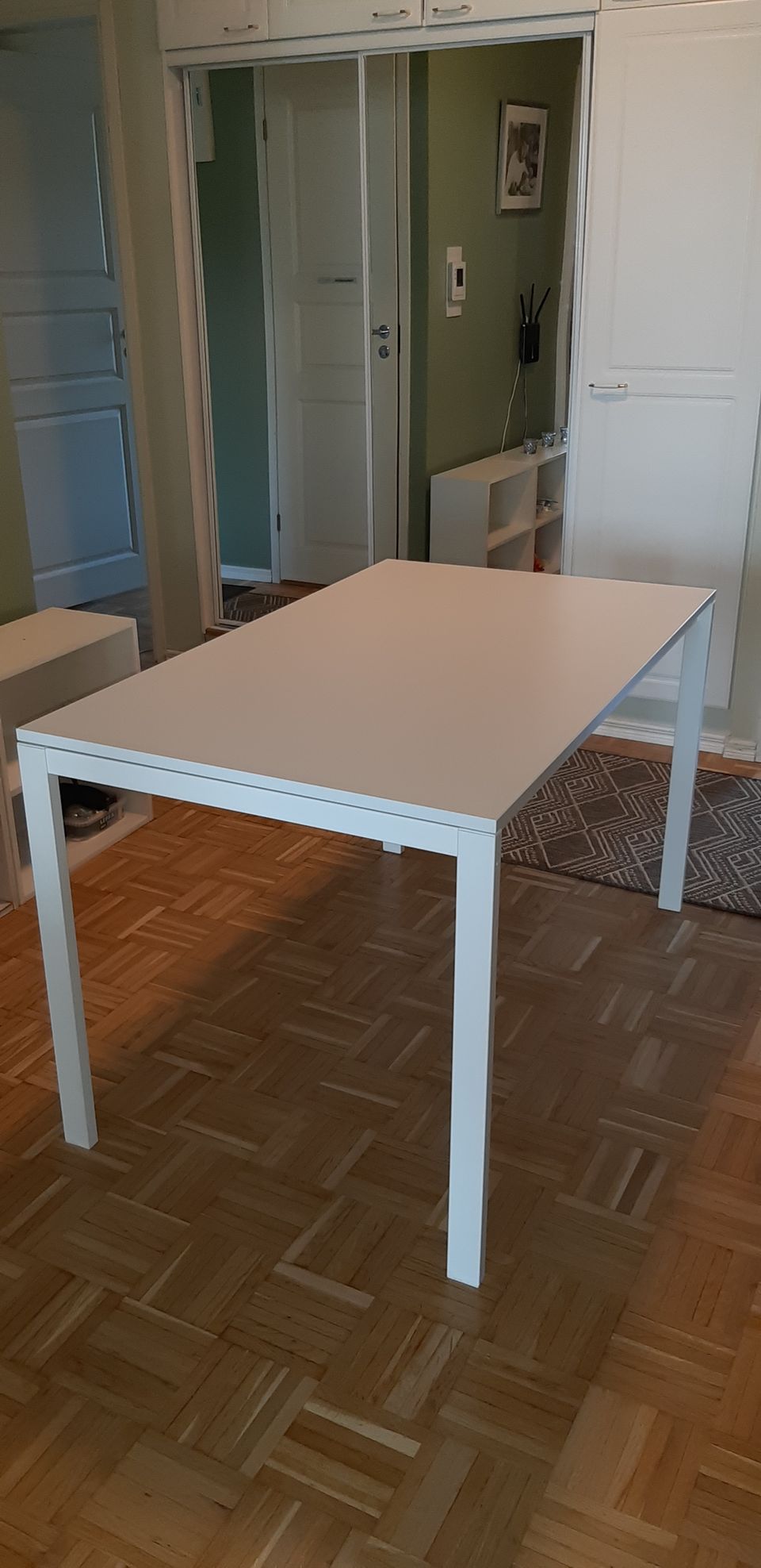 Valkoinen IKEA Melltorp-ruokapöytä 125×75cm
