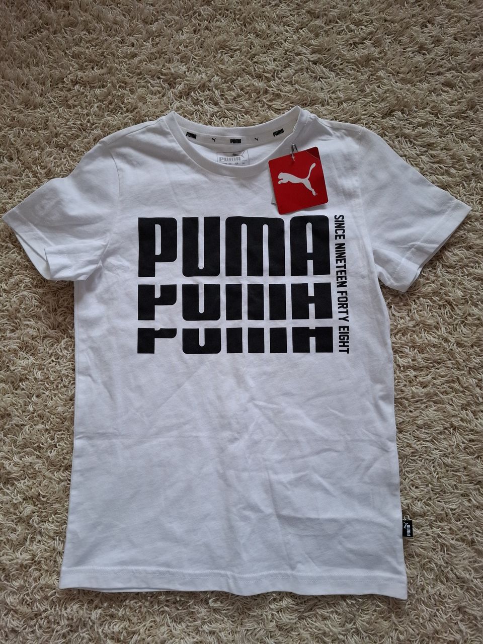 Uusi Puma T-paita 140 cm.