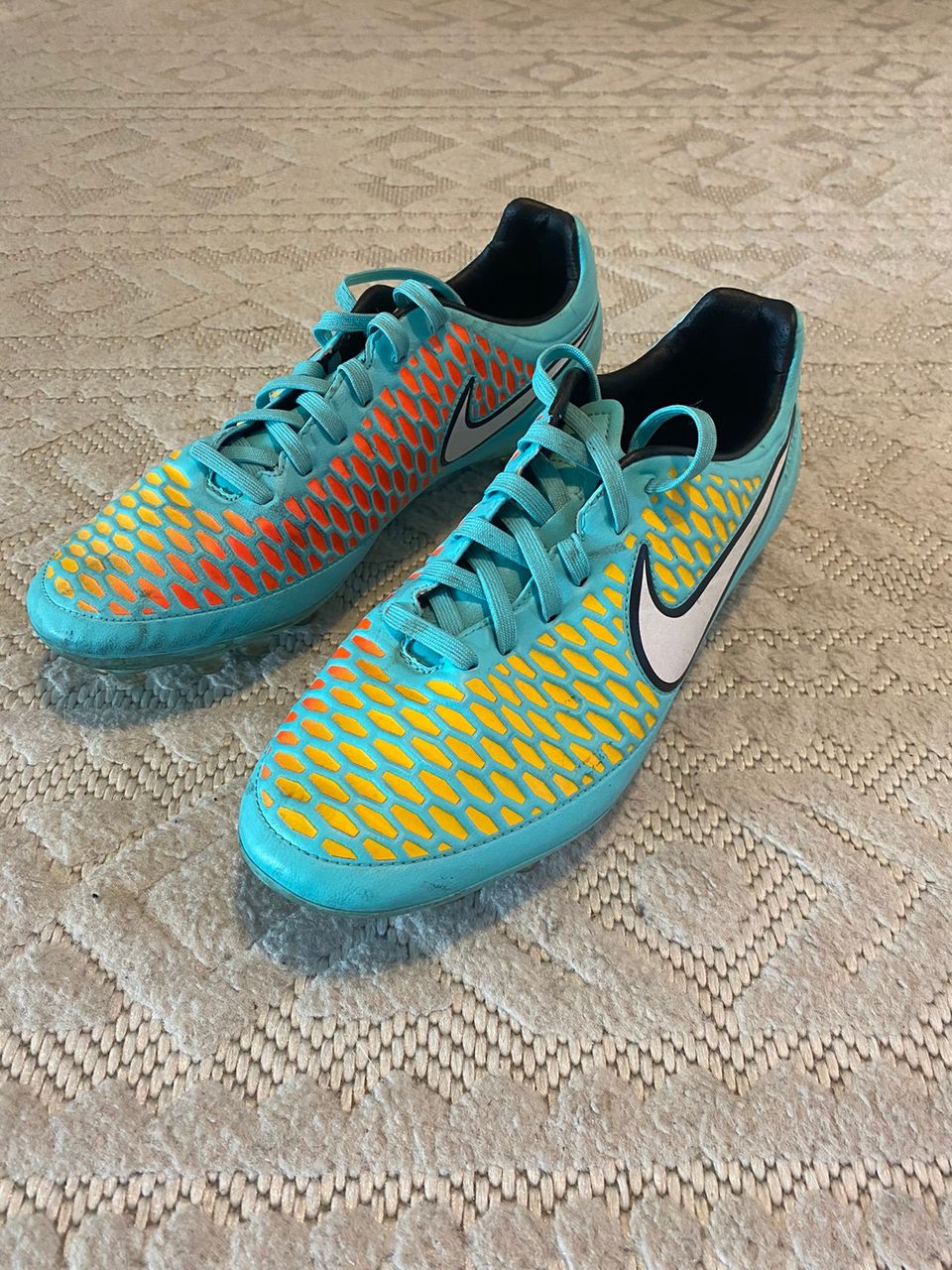 Nike magista nappikset