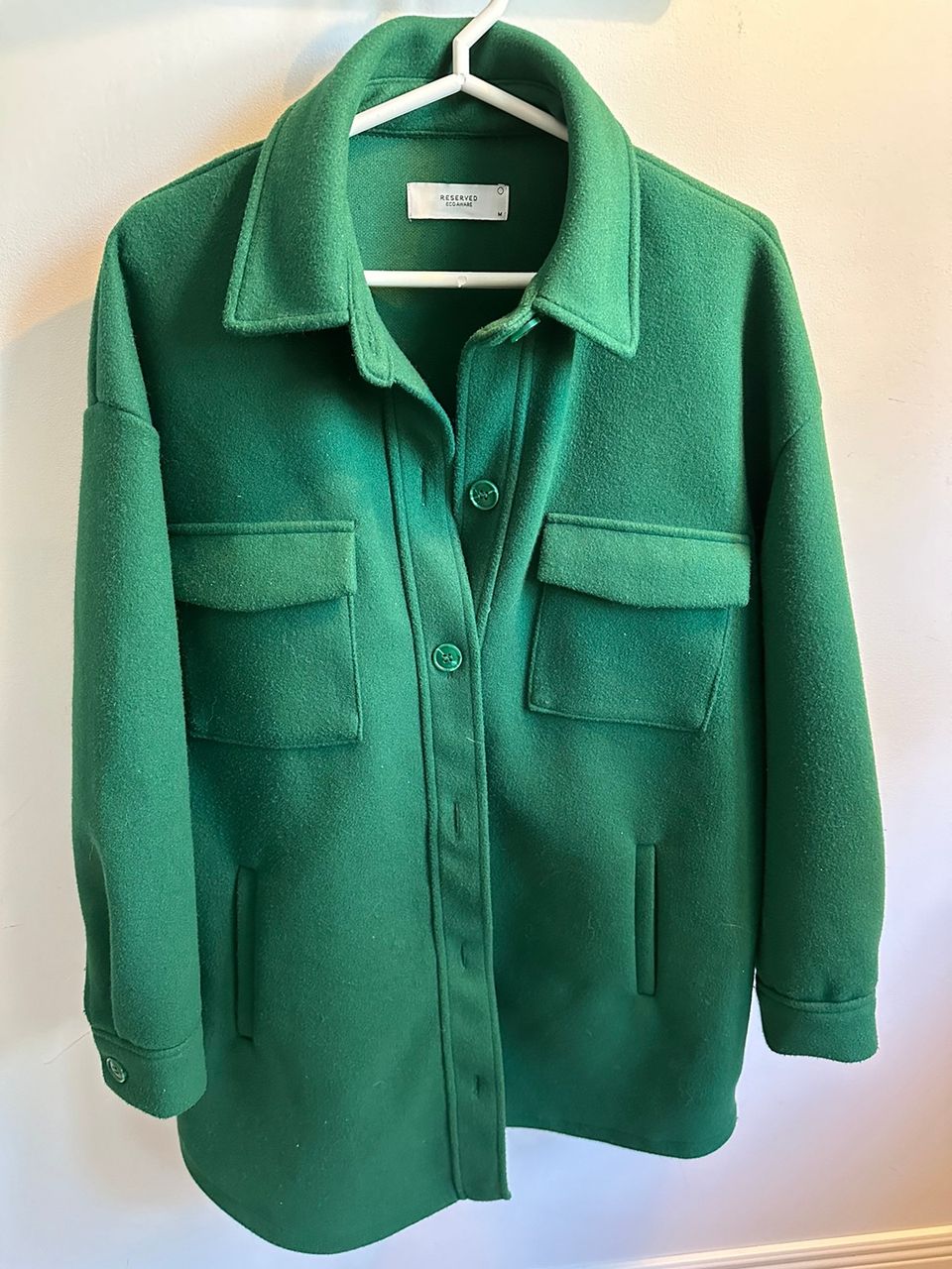 Vihreä fleece takki