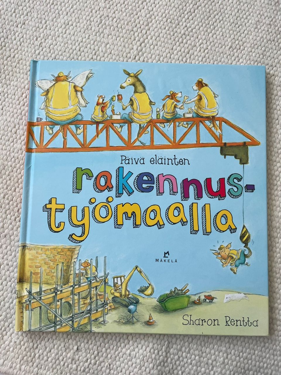 Päivä eläinten rakennustyömaalla -kirja