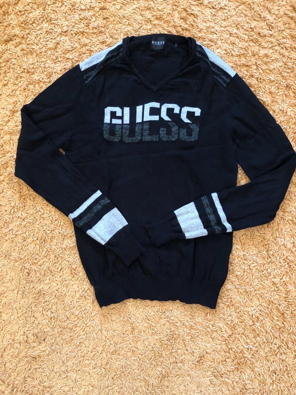 Pusero Guess