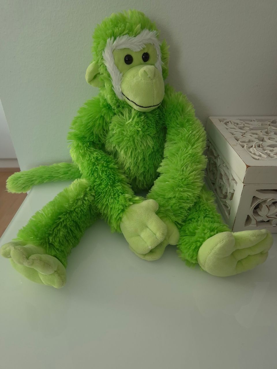 Vihreä apina pehmolelu