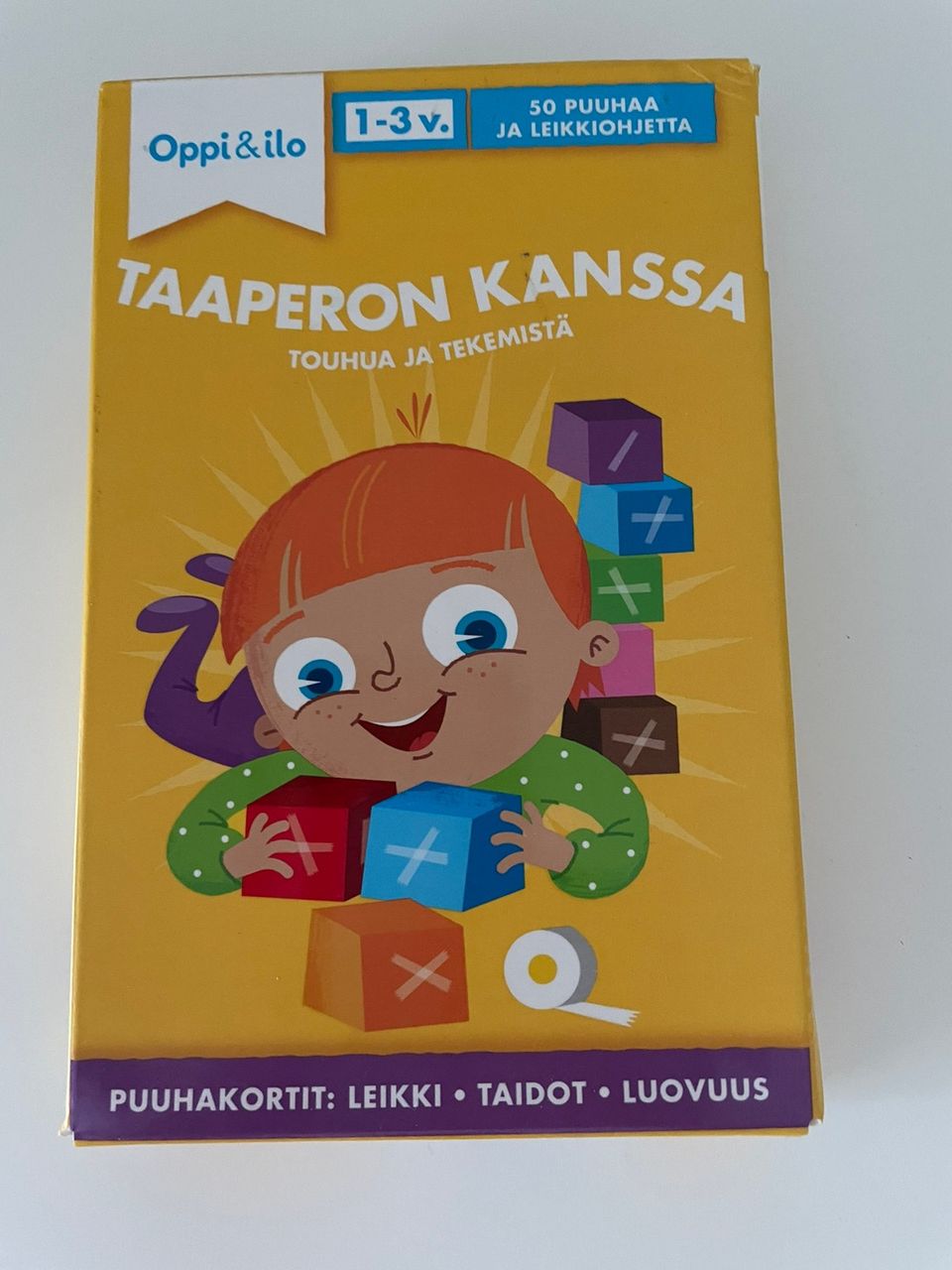 Tasperon kanssa kortit