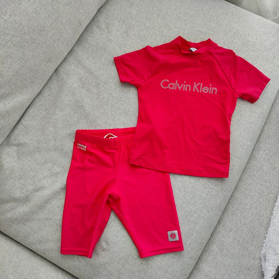 Calvin Klein UV paita ja Reima UV shortsit 104