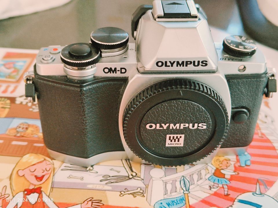 Olympus E-M10 Mark I (SC 7000)
