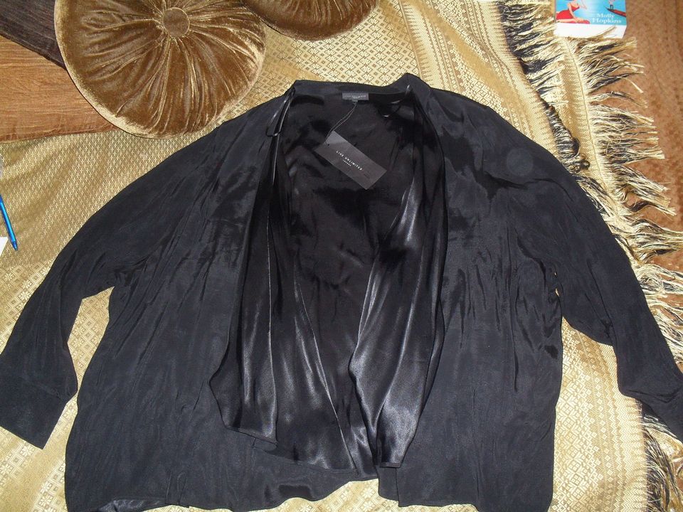 Musta jakku 56