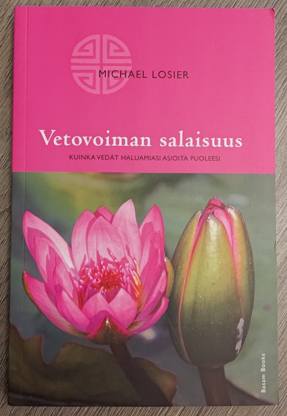 Vetovoiman salaisuus -kirja