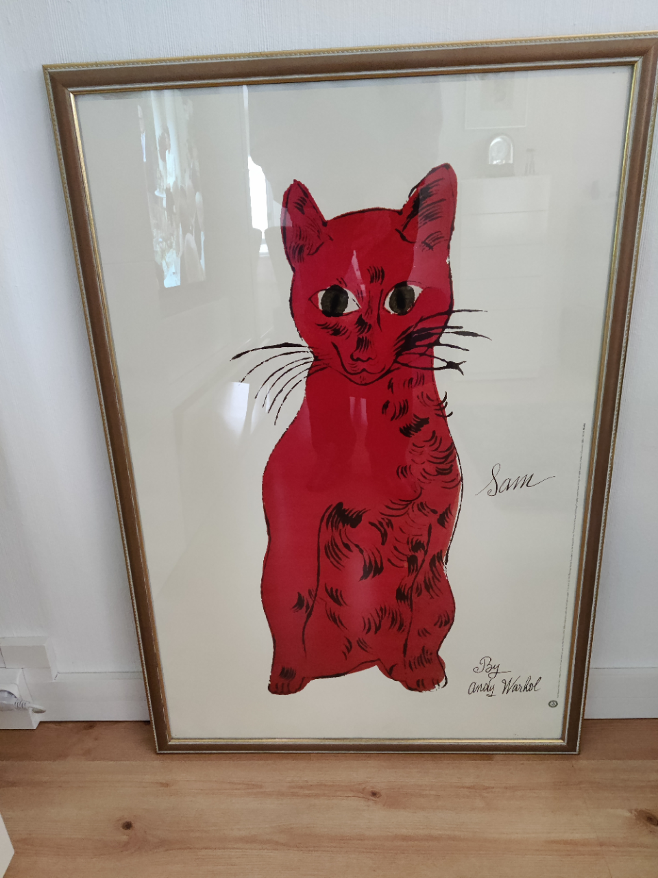 Andy Warholin "Sam kissa" taulusta tehty juliste Finnmirror kehyksissä.