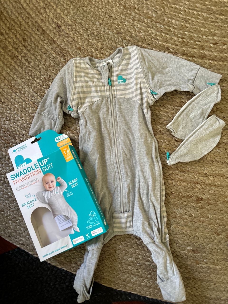 Swaddle up Transition suit koko M