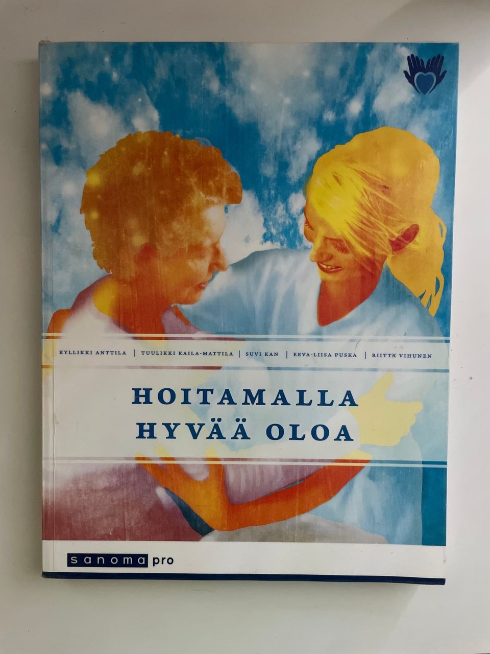 Hoitamalla hyvää oloa -kirja