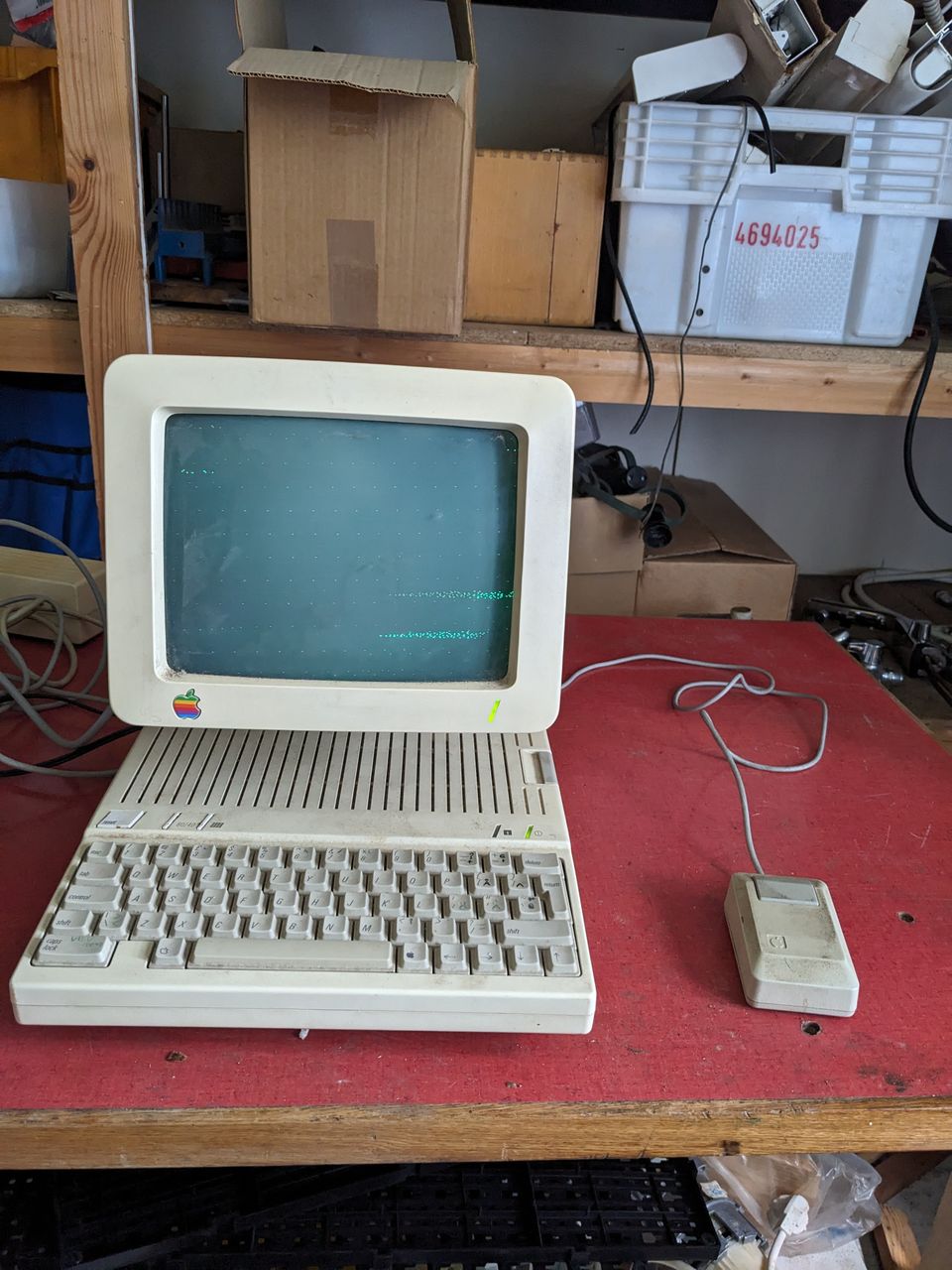 Apple IIc yksikkö, monitori ja alkuperäiset ohjekirjat