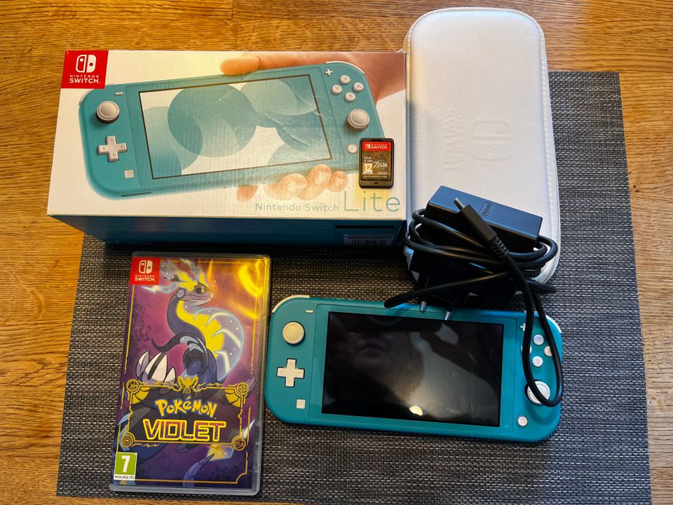 Nintendo switch lite ja kaksi peli+kanto laukku ja alkuperäiset laatikot
