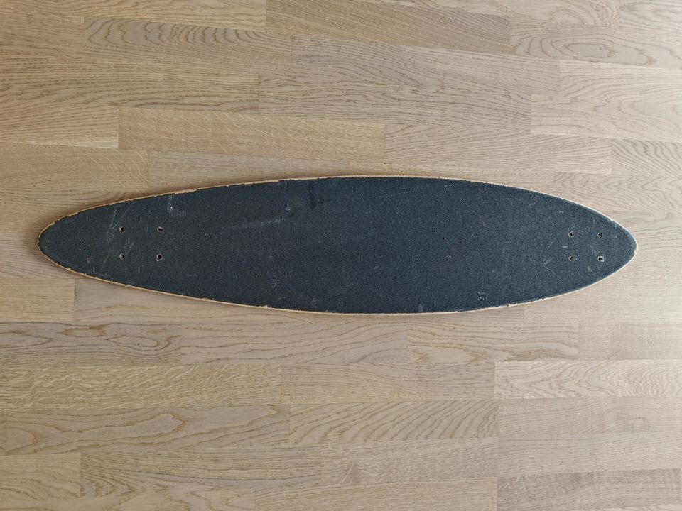 Warpin longboard ilman trukkeja tai renkaita