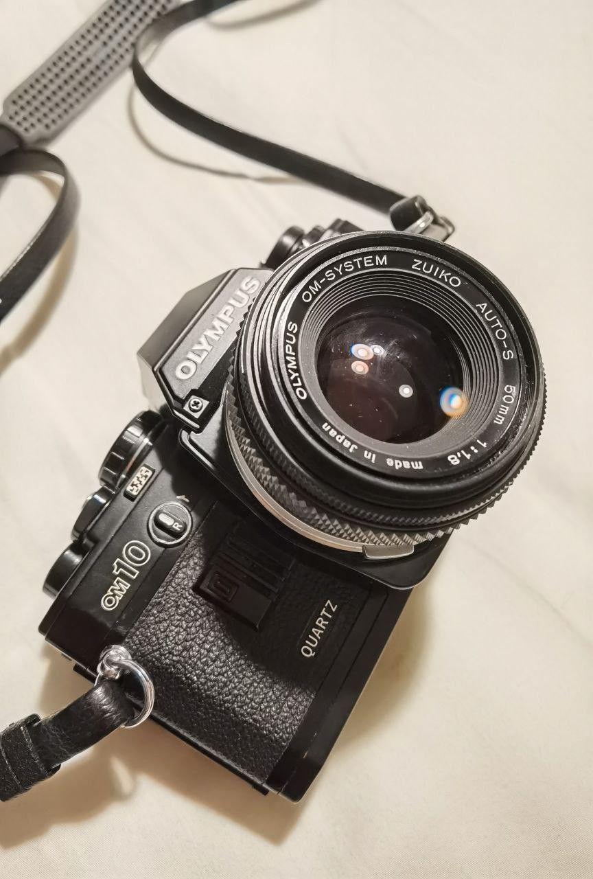 Olympus OM10 Quartz ja 3 objektiivia