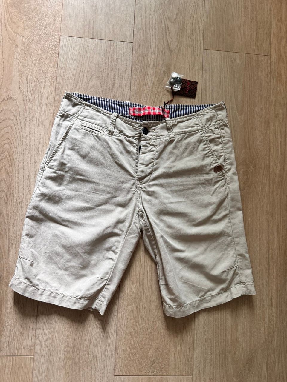 SAND miesten shortsit