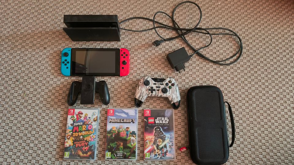 Nintendo Switch, 3 peliä ja 2 ohjainta