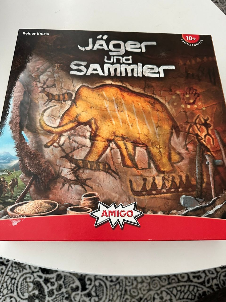 Jäger und Sammler-lautapeli. Sisältää saksan ja englanninkieliset ohjeet.