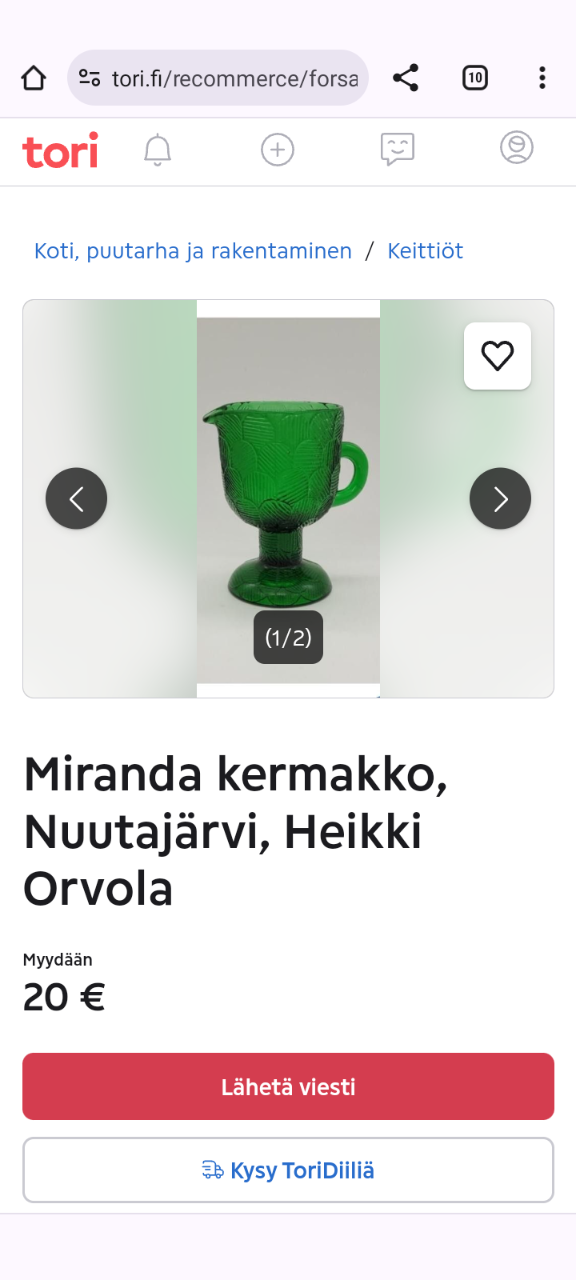 Vihreä lasinen kermakko