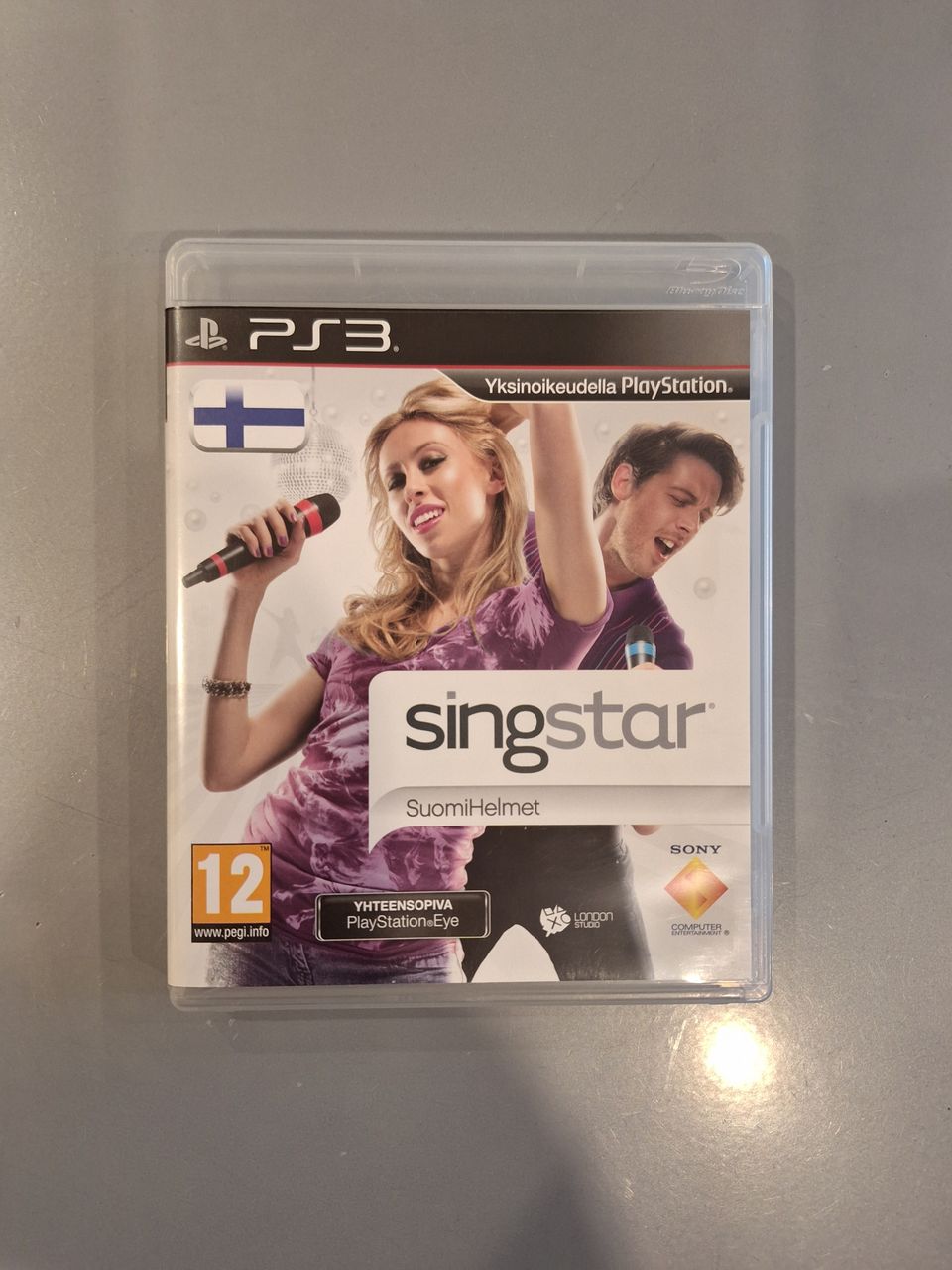 Playstation 3 peli. Singstar Suomi Helmet