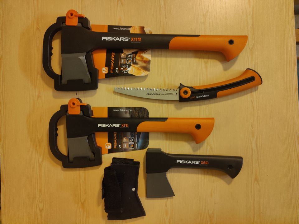 Fiskars Set of 3 Axes + a saw