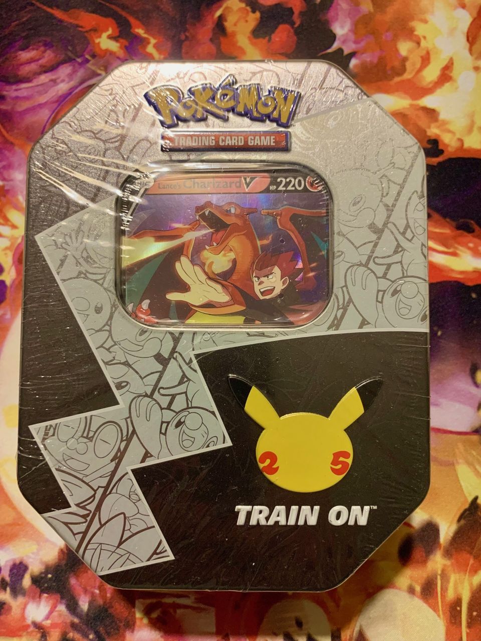 Pokemon TCG: Celebrations - Lance's Charizard V Tin (sealed)