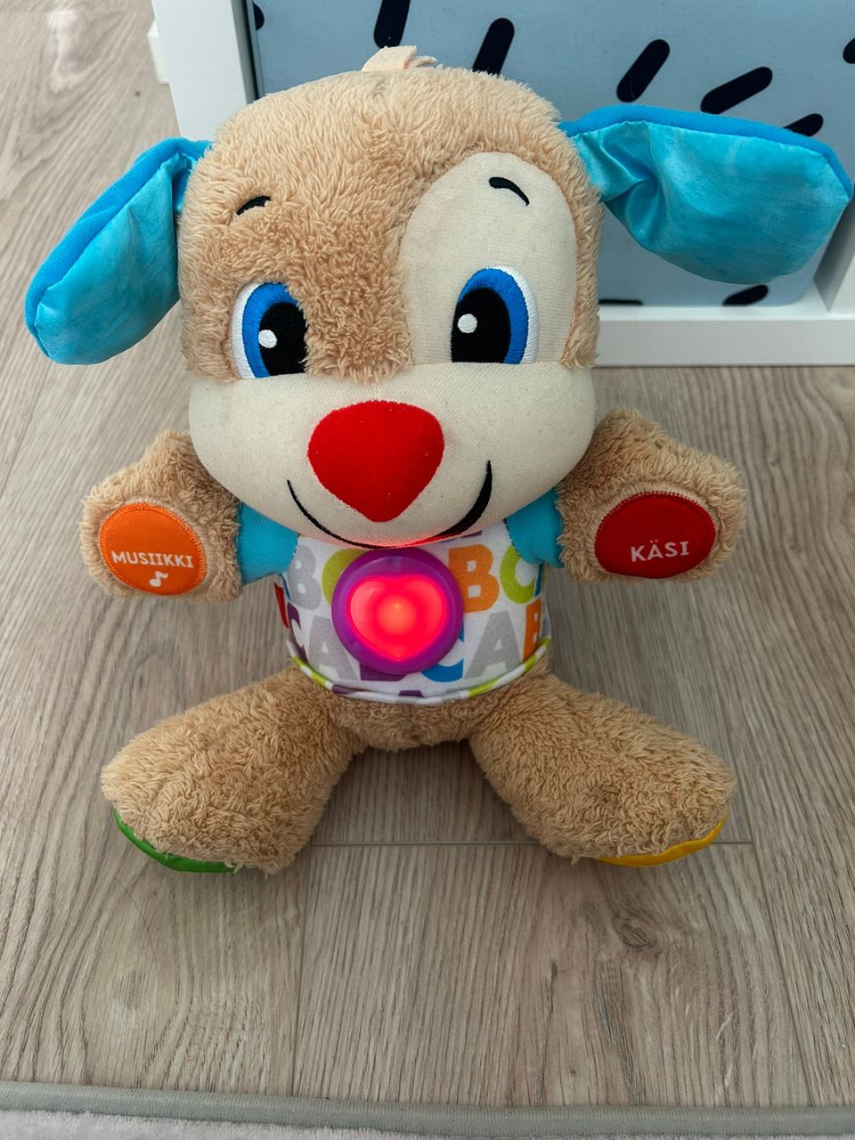 Fisher-price puhuva koira