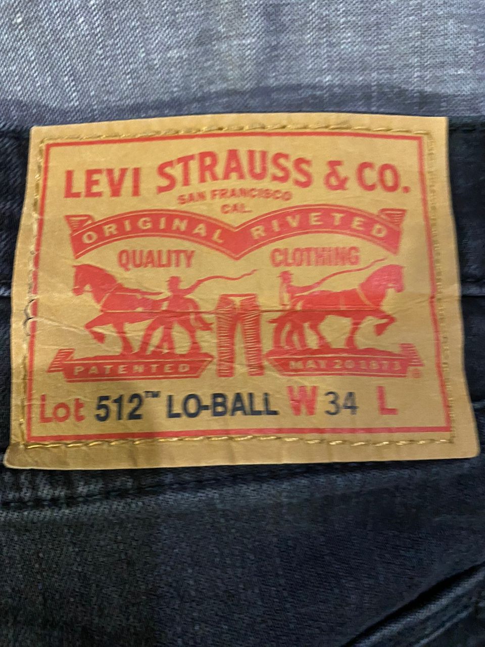 Levi’s 512 Slim Taper LO-BALL Mustat farkut