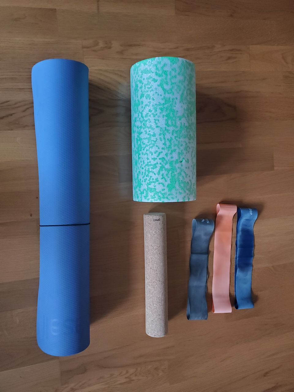 Exercise equipment: yoga mat, foam rollers, strength bands