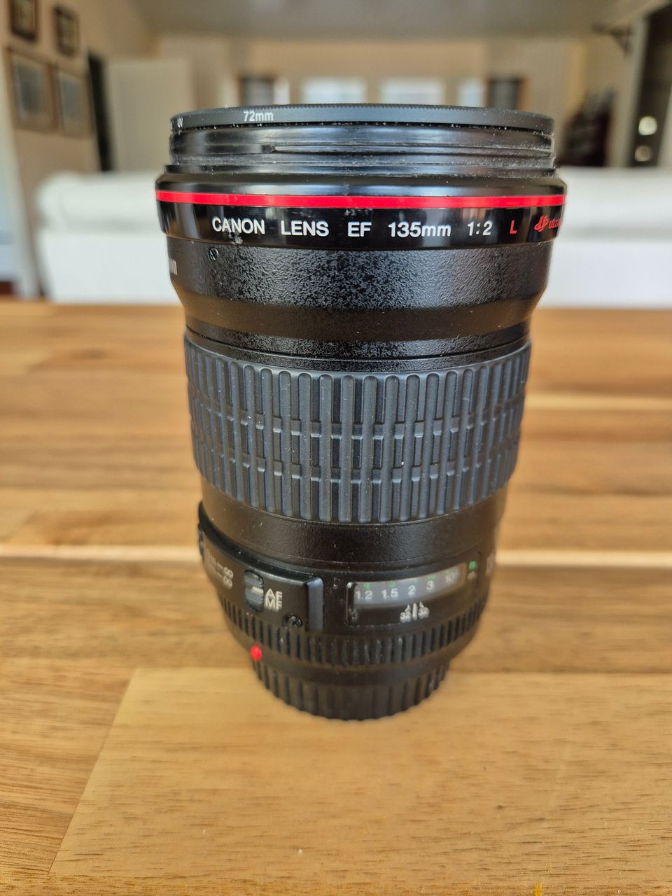 Canon Ef 135mm F2. L.  Tee tarjous